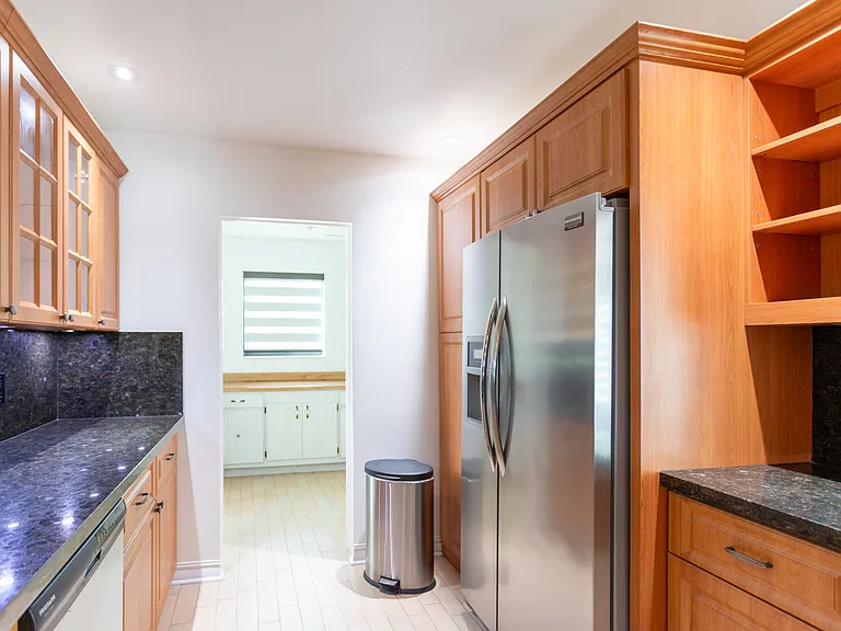 kitchen looking through to mud room/additional storage area
