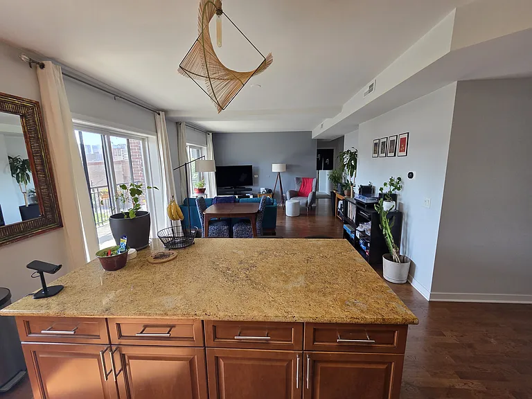 Kitchen facing dining/living room