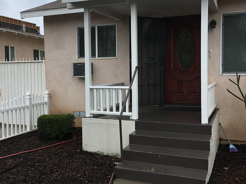 Front of house with brand new door