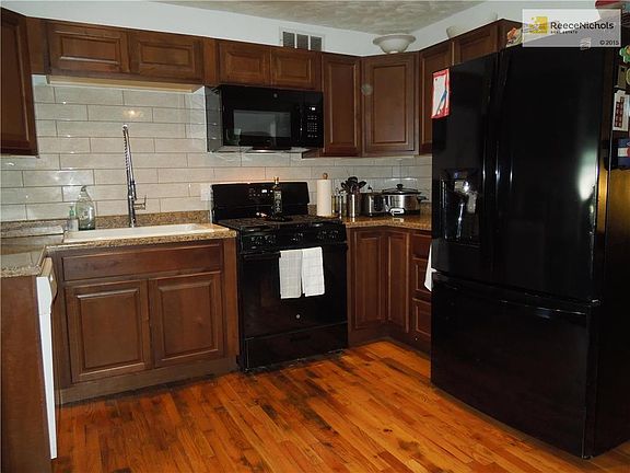 This is a Wow kitchen. Lots of new, check out the pretty brand new back splash too!