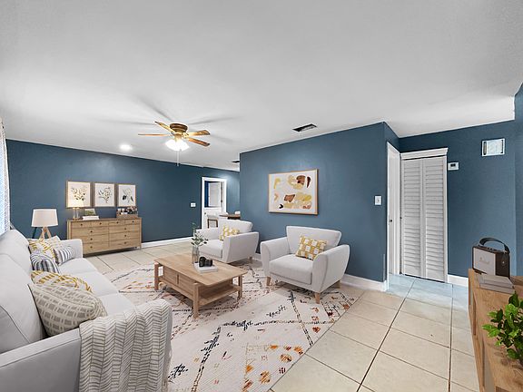 Living room area is large and bright.
