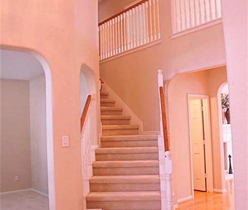 Gorgeous grand foyer with high ceilings.