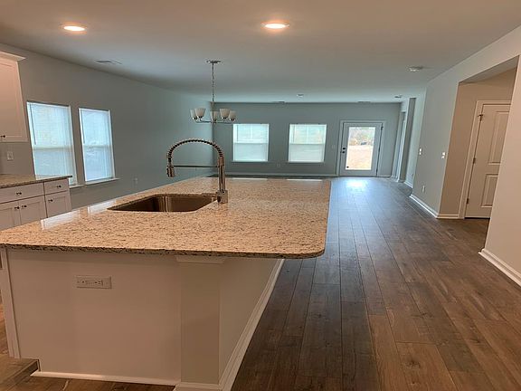 Gorgeous Wood Flooring and open concept. Living and dining are spacious and bright with lots of windows thru out this home.
