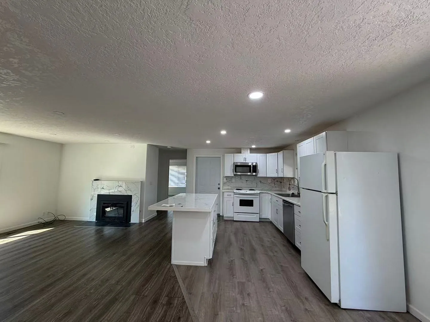 Remodeled Single-Level Home with Fenced Backyard — Photo 4