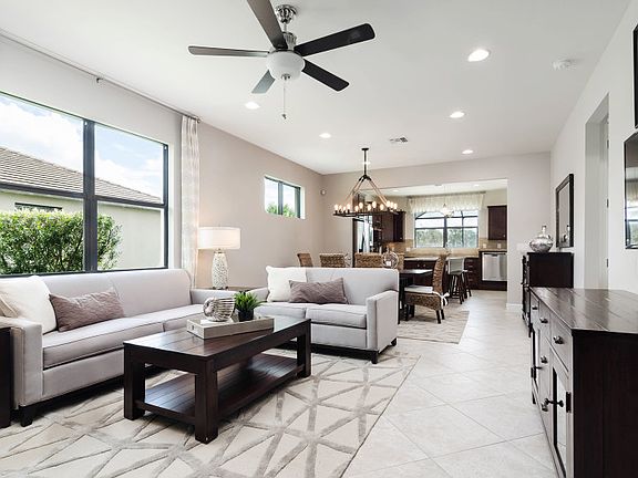 Model Representation Gathering room flowing from kitchen, great for entertaining