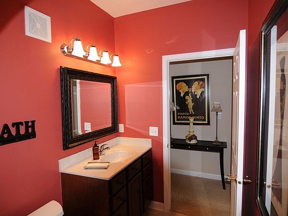 Quaint Guest Bath has great custom touches 