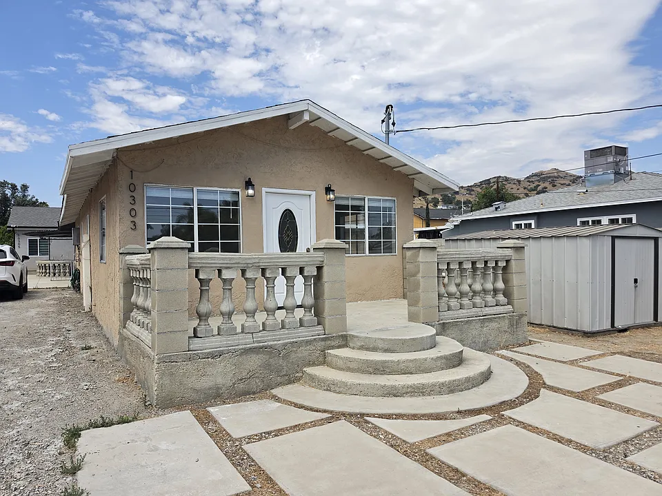 10303 Arminta St