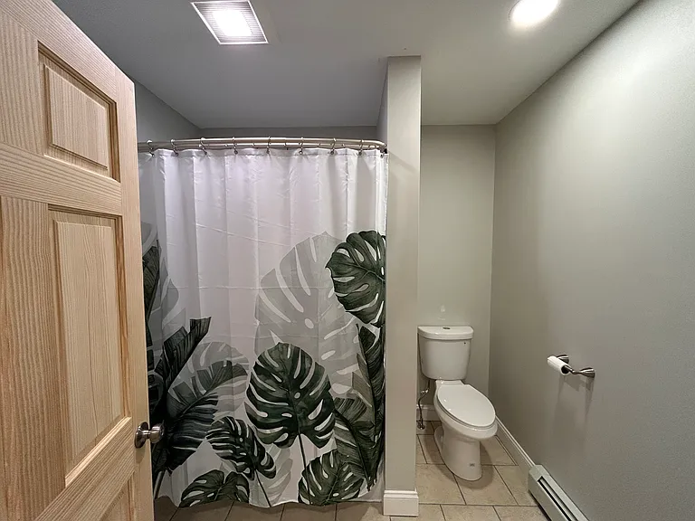 General use bathroom - full size tub, toilet, and vanity