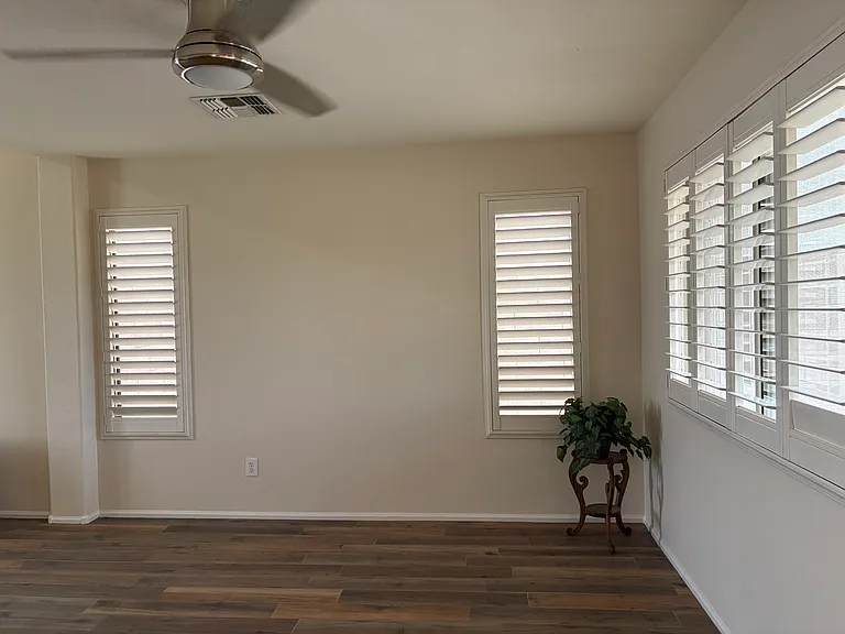 Great Room Ceiling Fan and Designer Shutters