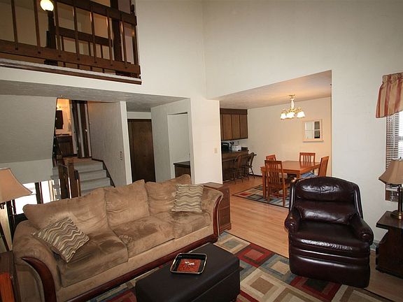 Living Room with Balcony Above