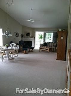 Dining / Living Area : Open area includes dining, kitchen, and living room - high cathedral ceiling.