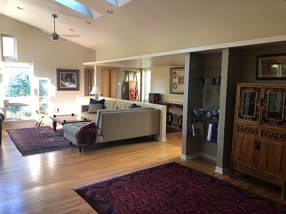 High ceilings and skylights provide an open and airy feel with natural lighting.