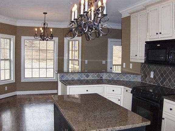 Custom cabinetry and tons of workspace fill this kitchen