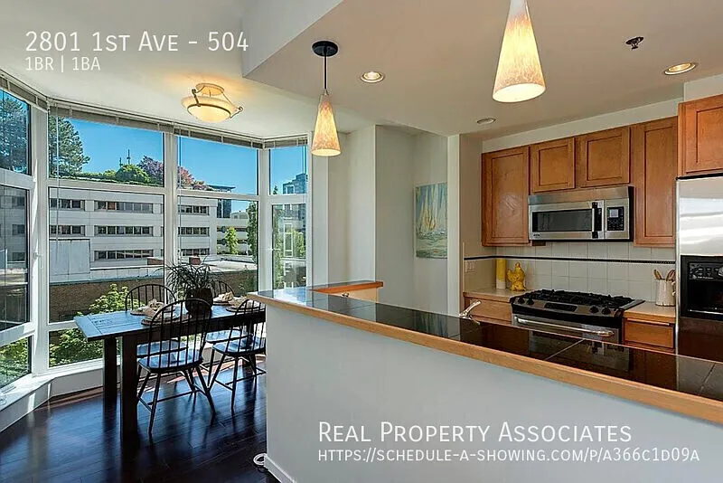 Amazing 1 Bedroom 1 Bath Corner Condo In Seattle * Garage Parking Available* — Photo 3
