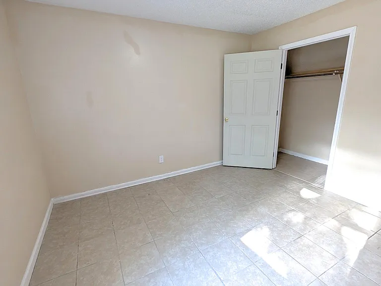 Bedroom 1 with generously-sized closet