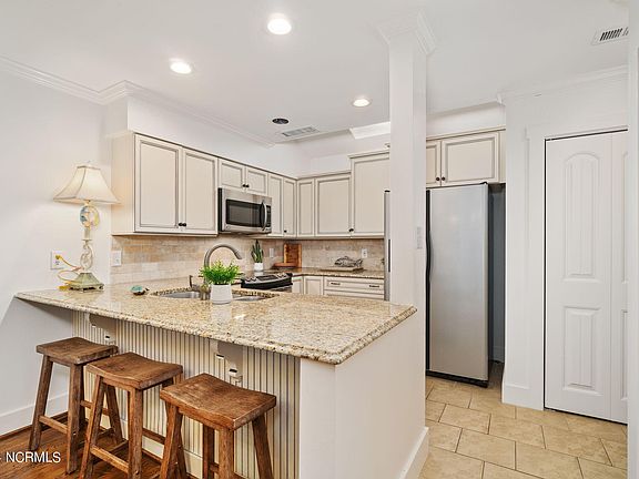 5th image of 566 Coral Drive #A26 Fiddlers Walk Condomi