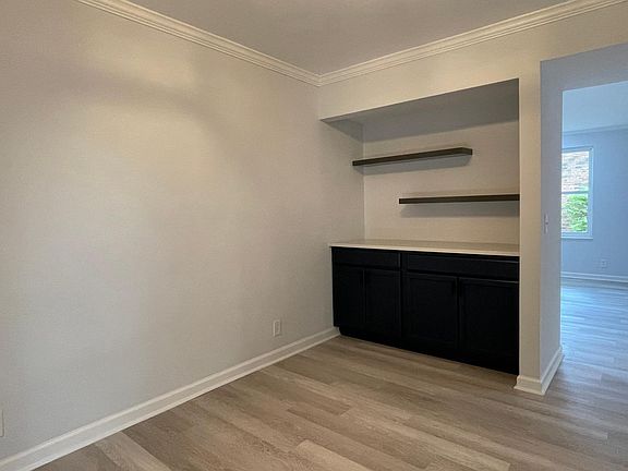 Buffet and Storage Area in Dining Room