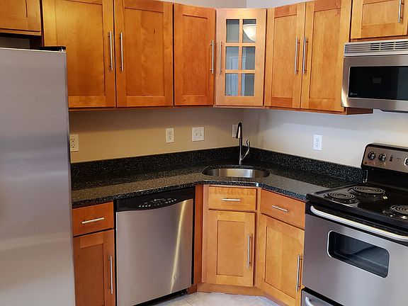 Fully renovated and upgraded kitchen. Granite counters and real wood cabinets.