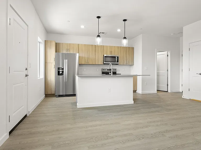 Open living area with attached garage