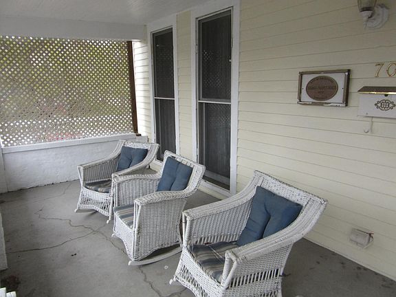 sitting porch with antique rockers