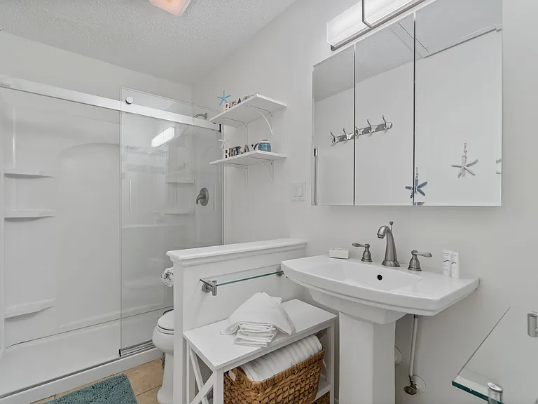 Ensuite Master bathroom with shower, toilet, and starter basic necessities