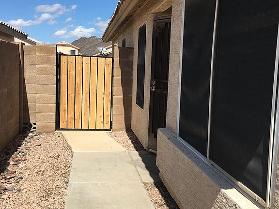 The walkway to the front door and back gate.