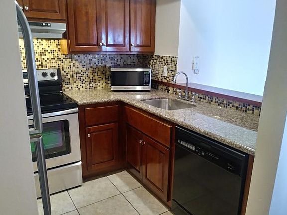 4th image of 1530 SE Royal Green Cir #R202