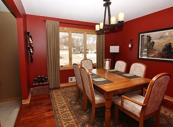 Formal dining room features Mahogany hardwood floors and convenient kitchen access!