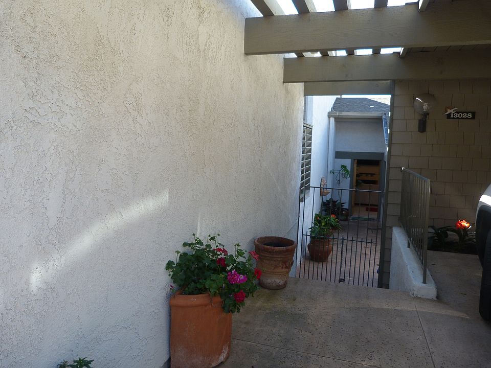 Entry walkway and carport