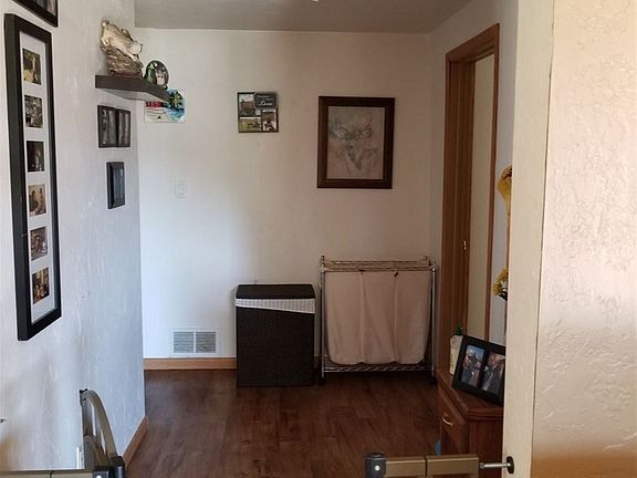 Hallway in lower with storage closet