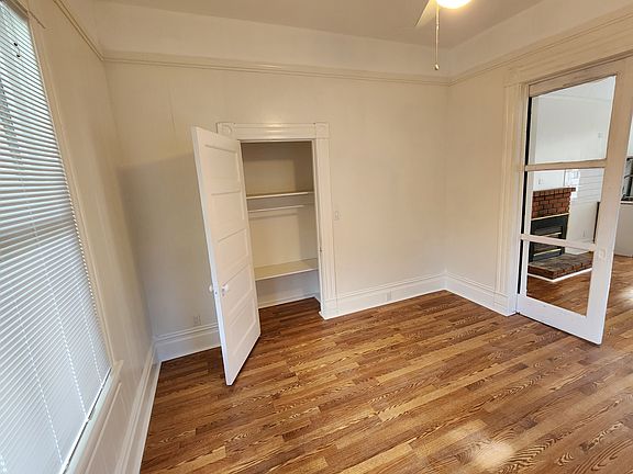 Front bedroom with closet open