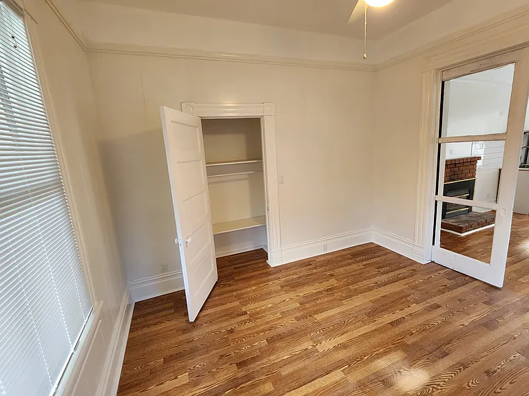 Front bedroom with closet open