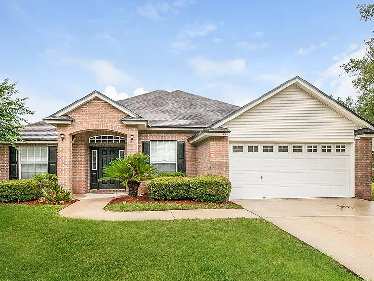3243 Wandering Oaks Dr — Photo 1