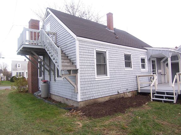 Showing rear side. Second floor bedroom with deck.