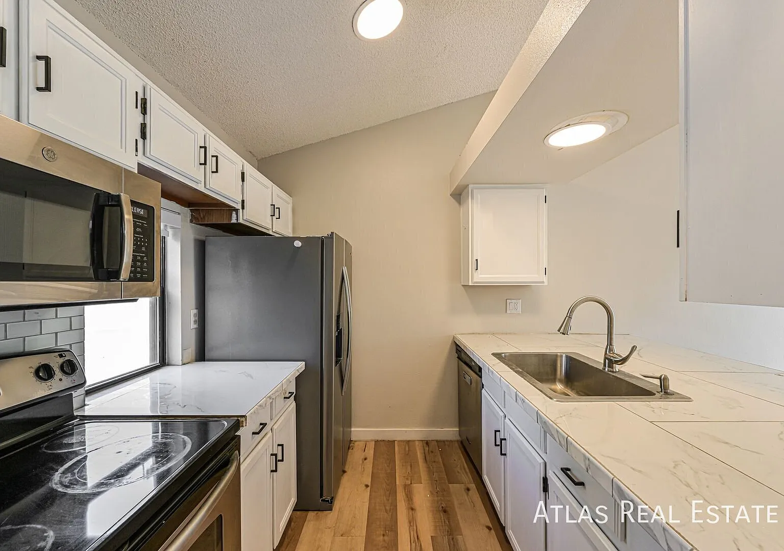 Save $2650! Spacious Aurora Home with Stainless Appliances, 2 Balconies & A/C — Photo 4
