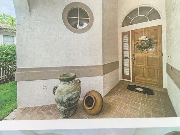 Front entrance to the house at; 12207 Glencliff Circle in Westchase.