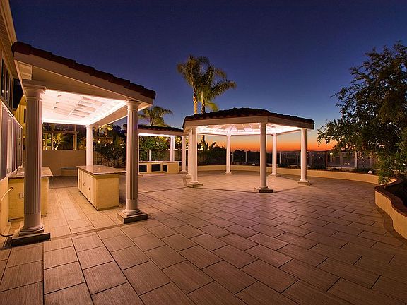 Backyard gazebos at night.