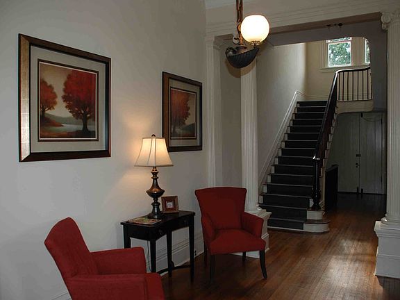 Grand foyer with original fixture.