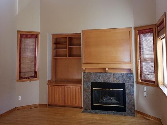 Family Room with gas fireplace, soaring ceilings