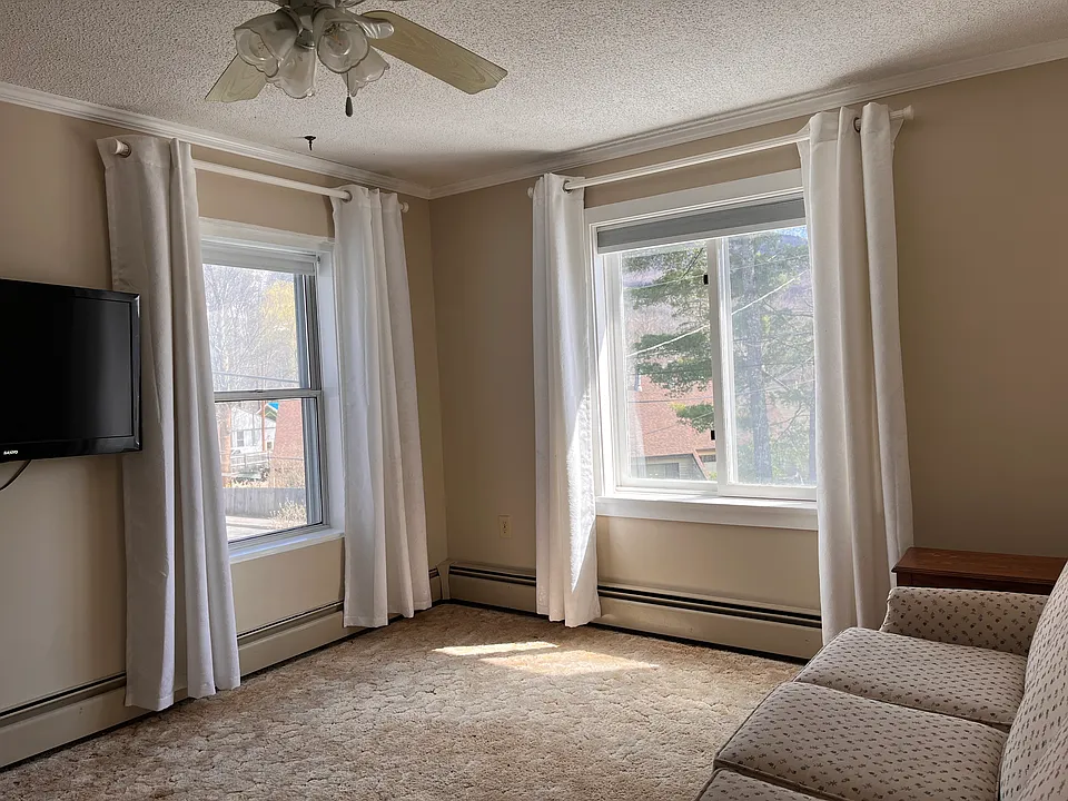 You can see Loon Mountain from these living room windows.