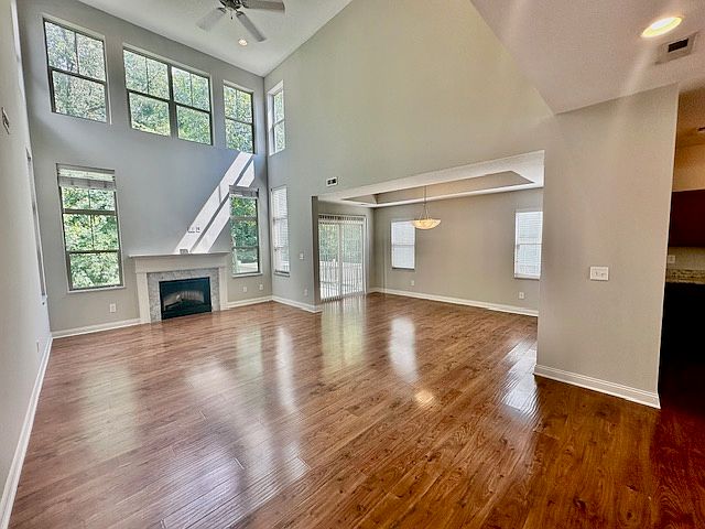 Large Living Room & Dining Area - With Vaulted Ceiling and Fireplace