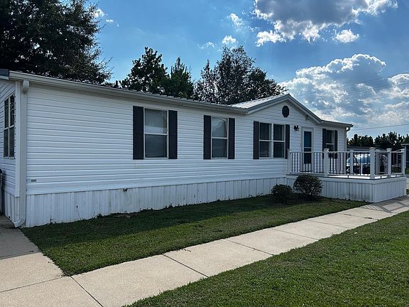 front of home, sidewalk to back entrance.