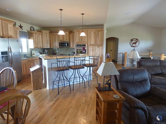 Beautiful wood flooring throughout the main level. Hickory kitchen cabinets.