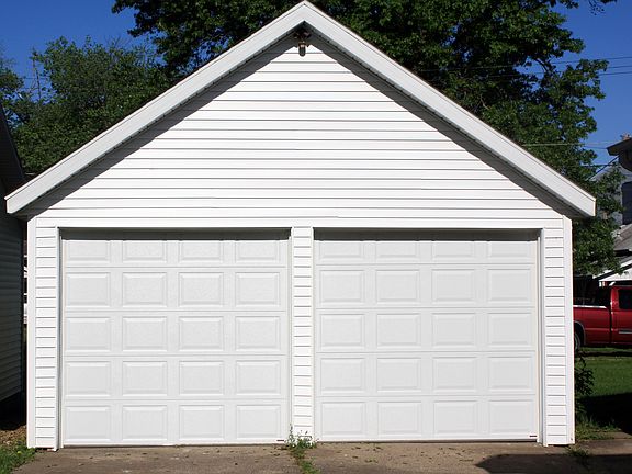 Resided Garage w/ new doors