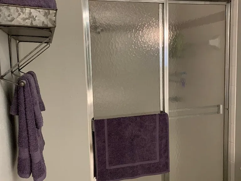 Guest Bathroom with door to Lanai/Pool area