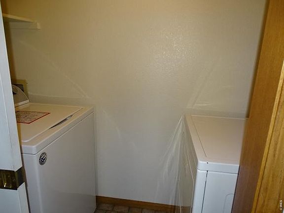 5th image of 211 N 49th Ave Pl