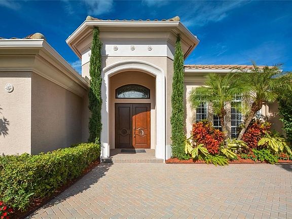 Custom entry way with electric roll down shutters