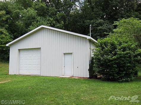 30 X 40 pole barn is finished, heated and has electric.