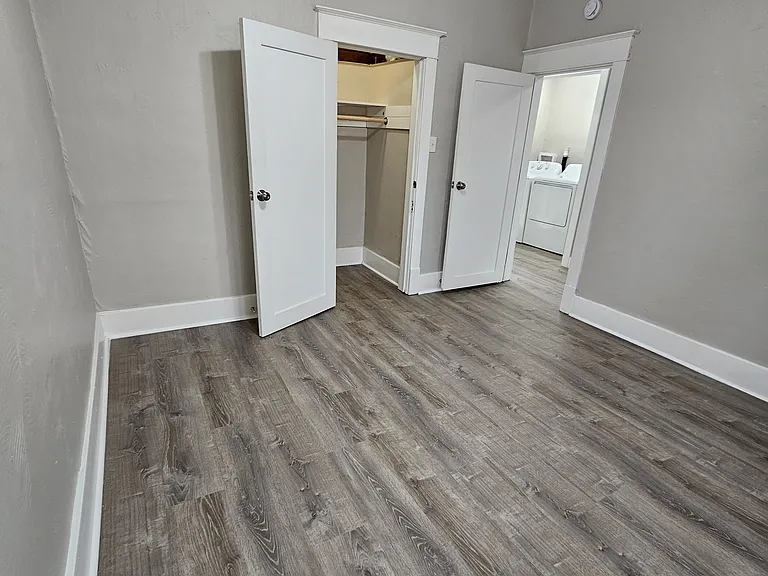 Rear Bedroom 11' x 11' with ceiling fan