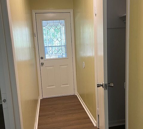 Front door with coat closet